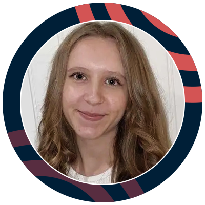 Smiling young woman with long dirty blond hair and wearing a white top