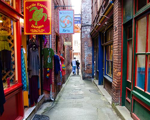 An alley with colourful shops.